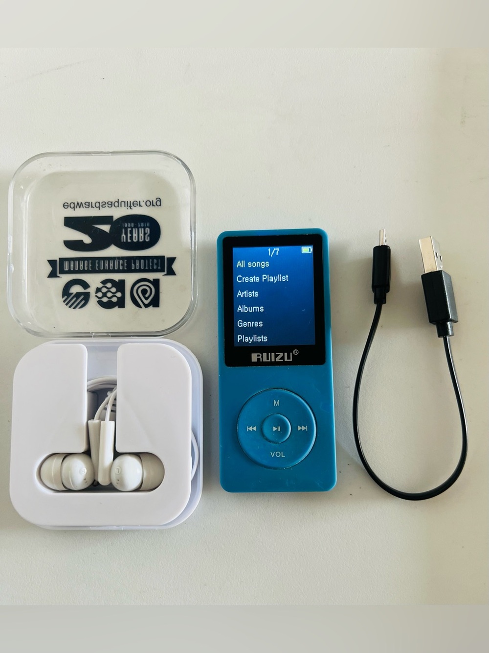 XO2 Blue Portable MP3 Player with Earbuds and USB Cable in Working Perfectly